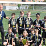 2017-2018 Wheaton Wings 2009 White - Wheaton Spring Classic Champion team group photo