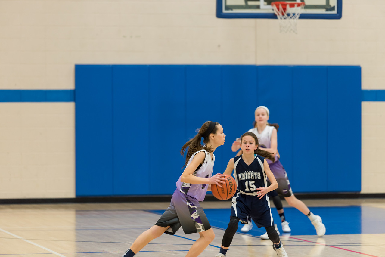young-girls-playing-basketball